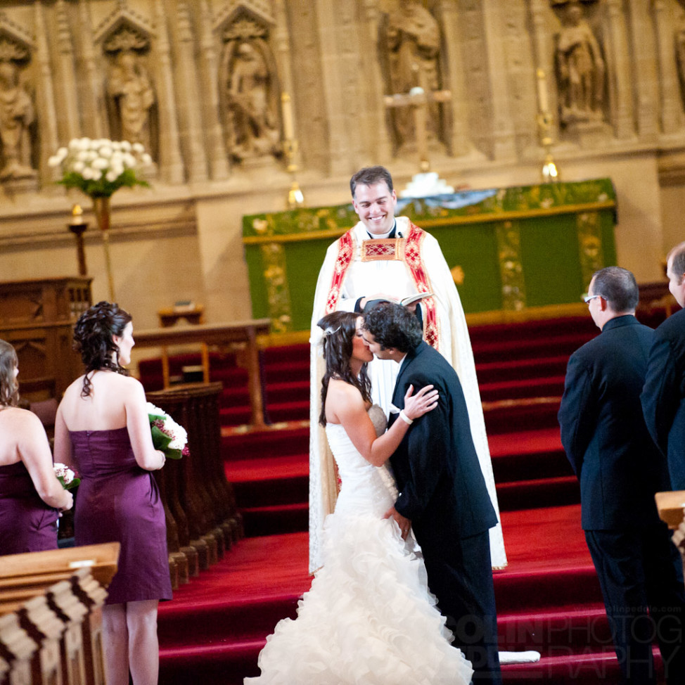 Their first kiss during their wedding ceremony.