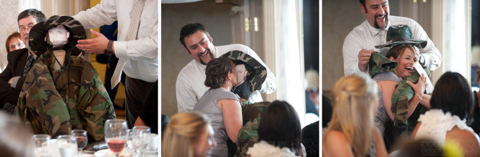 A bridesmaid kisses a cardboard cut out of her husband who is serving in the Canadian Military overseas.