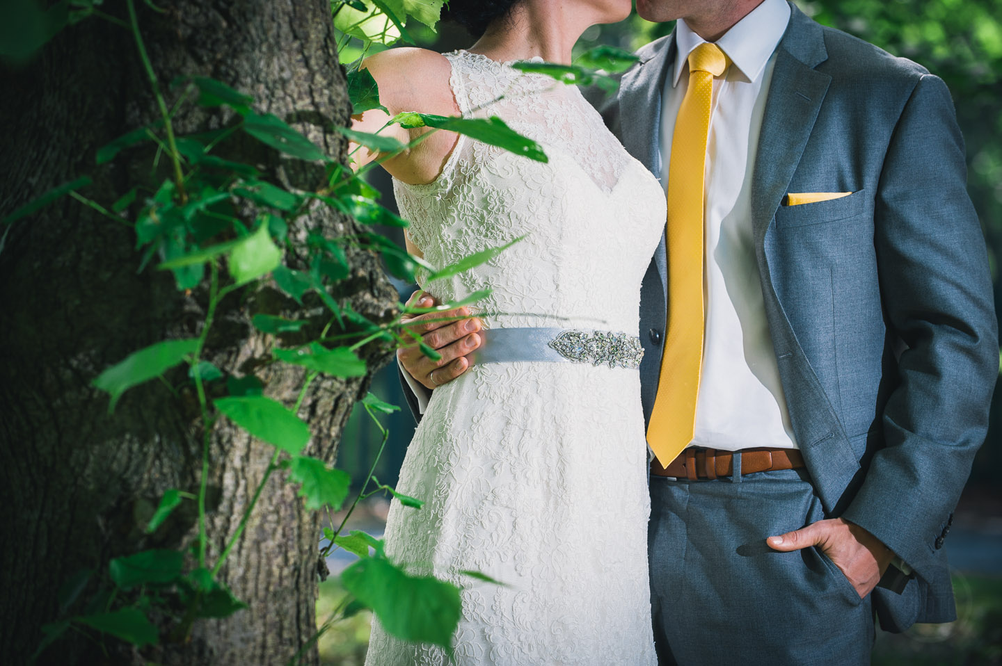 A bride and groom embrace during a Newfoundland wedding photography session.