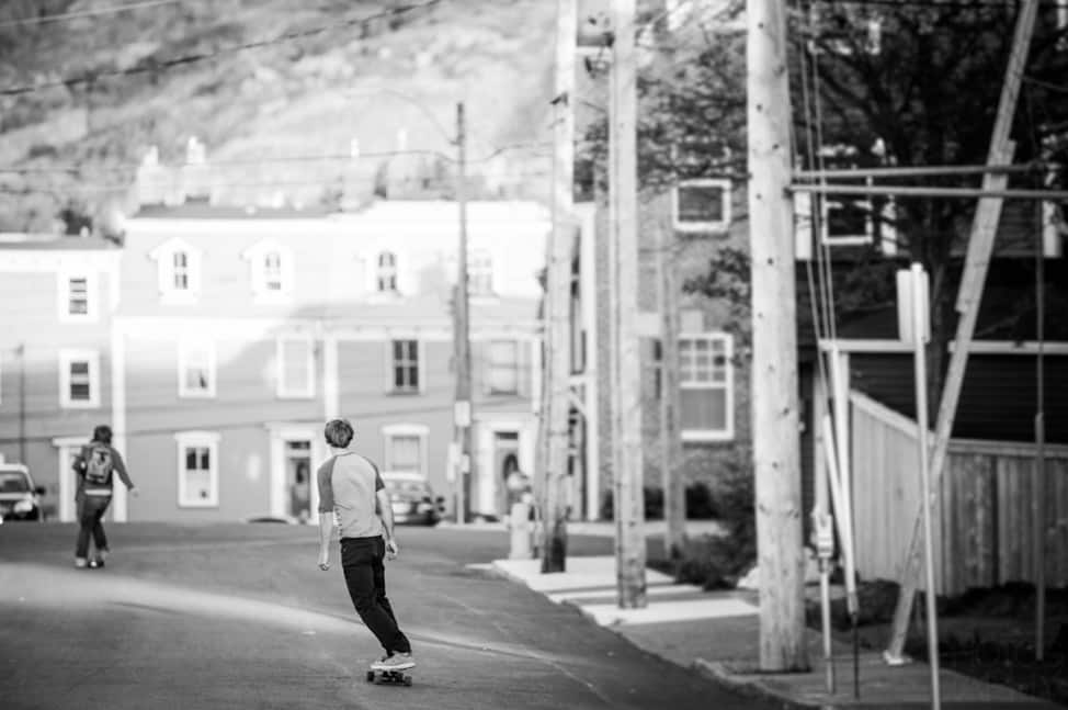 Longboarders make their way down a downtown St. John's Street