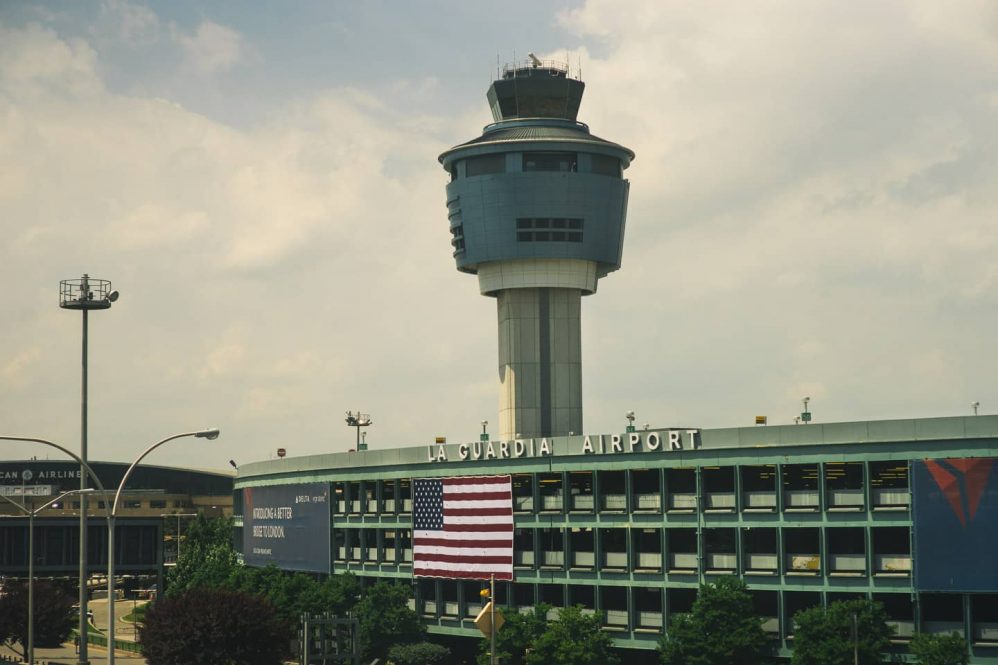La Guardia Airport tower and usa flag.