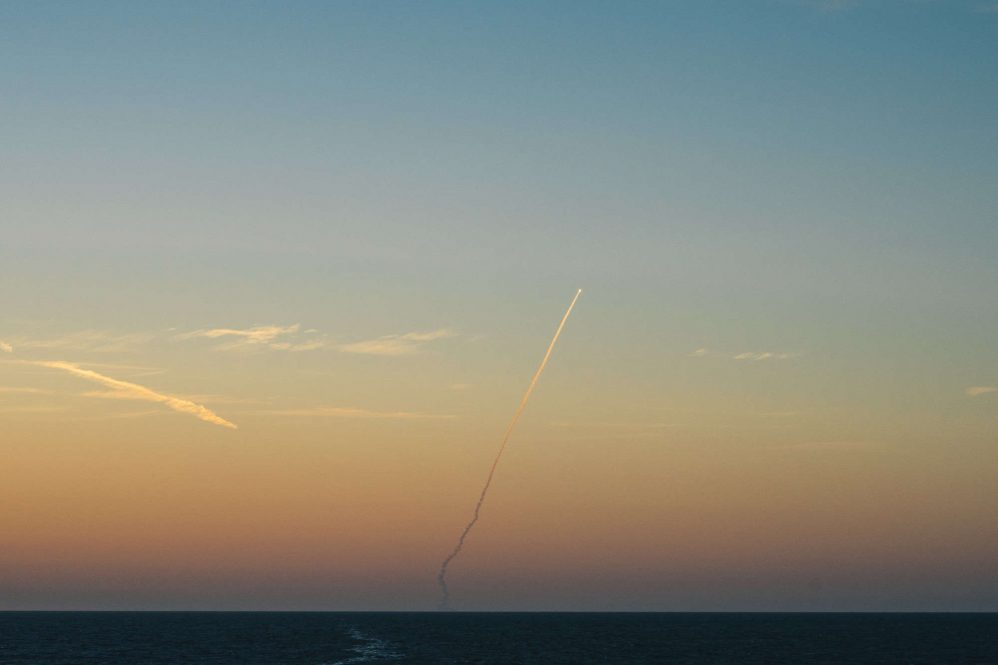 A rocket blasts off from Cape Canaveral carrying a payload of one satellite set for Earth orbit.