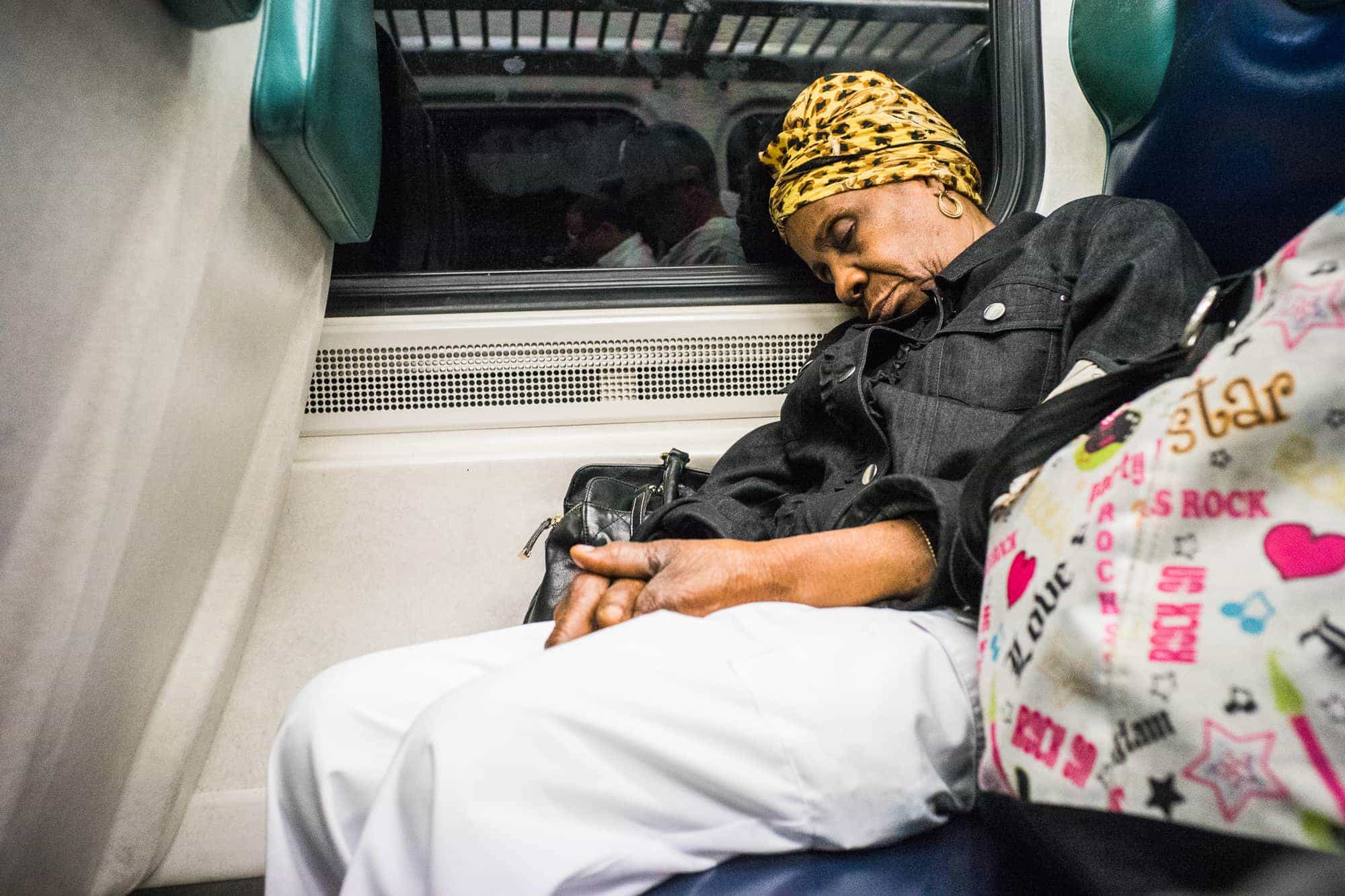 New York City, N.Y. - A woman naps on a Metro North train on it's way into Manhattan.