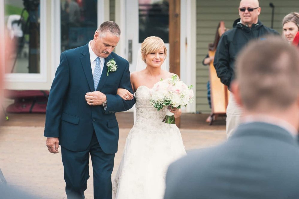 And fast forward to the ceremony with Tina and her dad walking down the aisle.