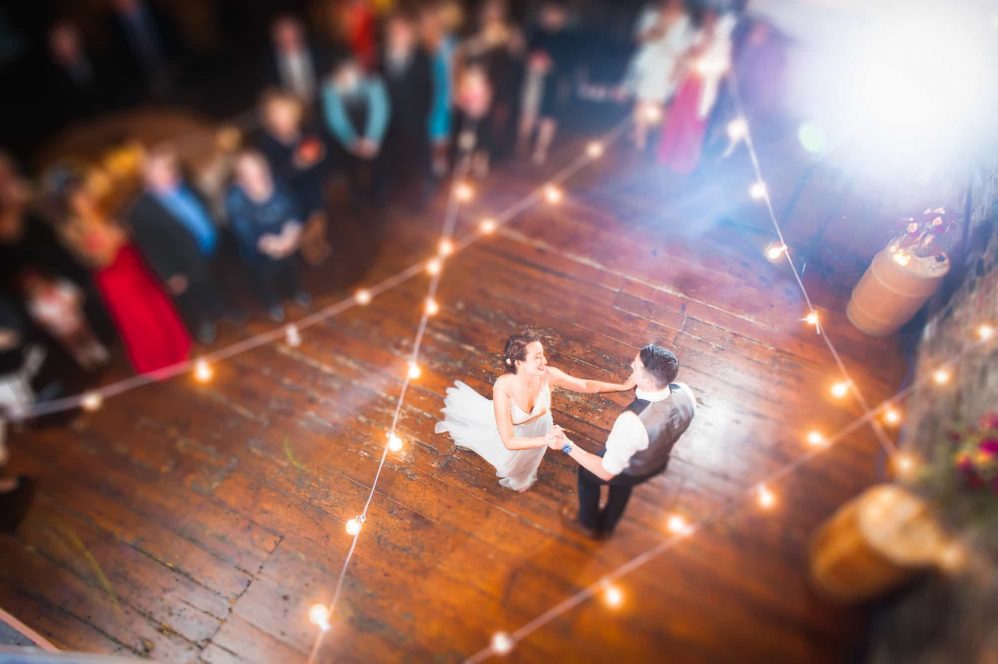 A photograph from above of the bride and groom sharing their first dance.