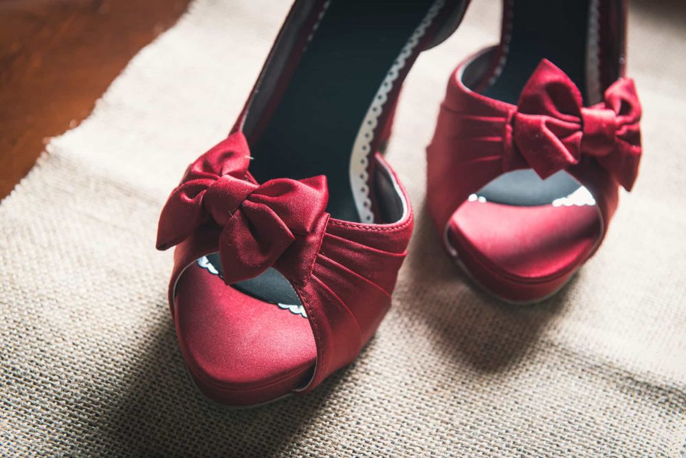 The brides red shoes.