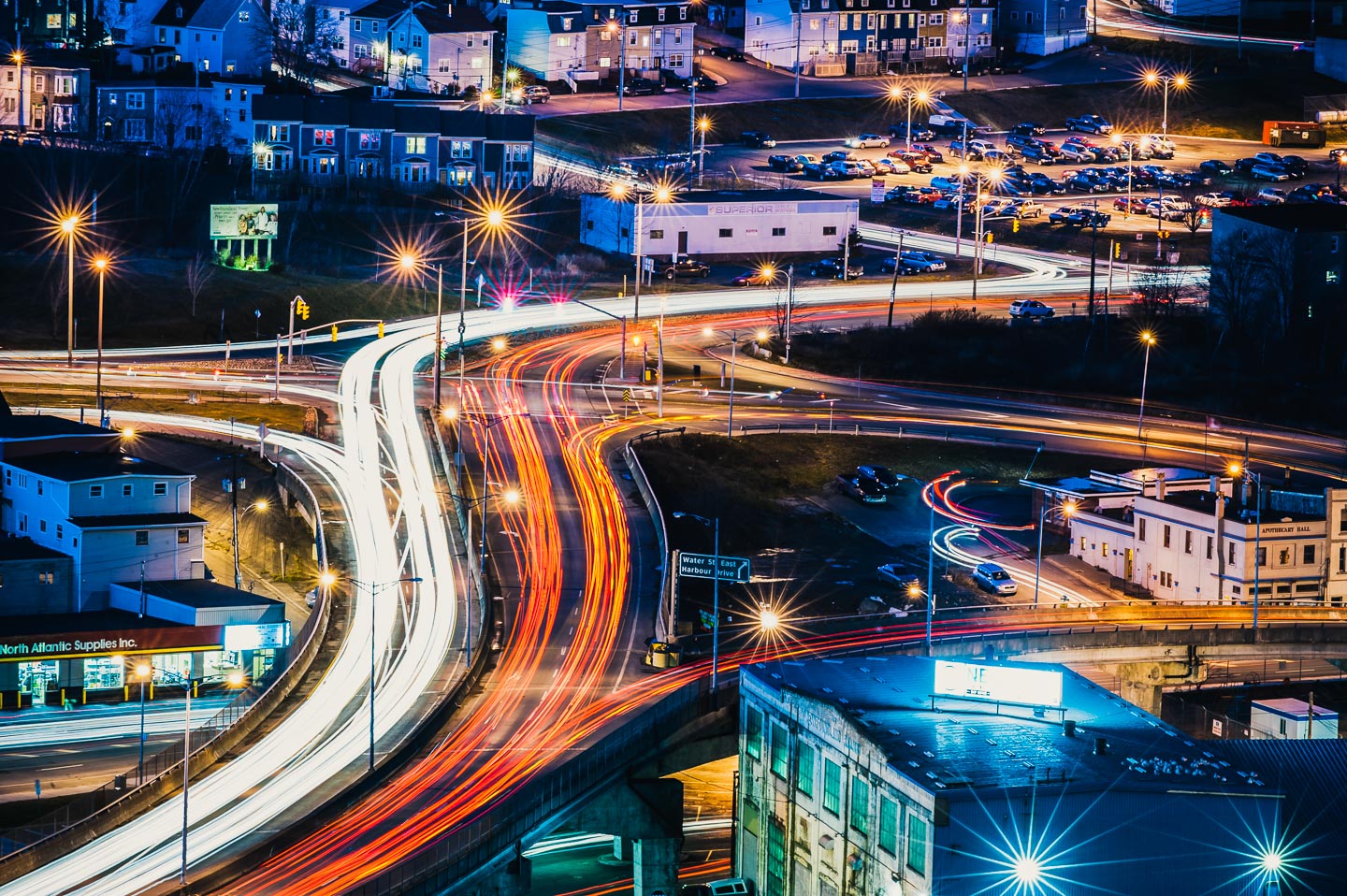 A colorful timelapse photograph of the harbor arterial from where it crosses the viaduct into down town St. John's, Newfoundland, Canada.