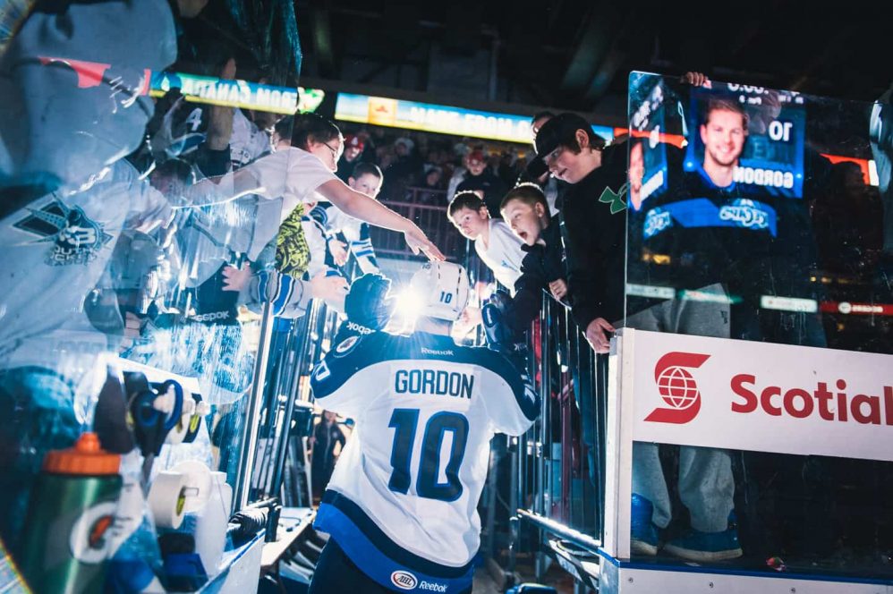 Andrew Gordon steps off the ice and under the fans. He was first star of the playoff game that saw the Albany Devils eliminated.