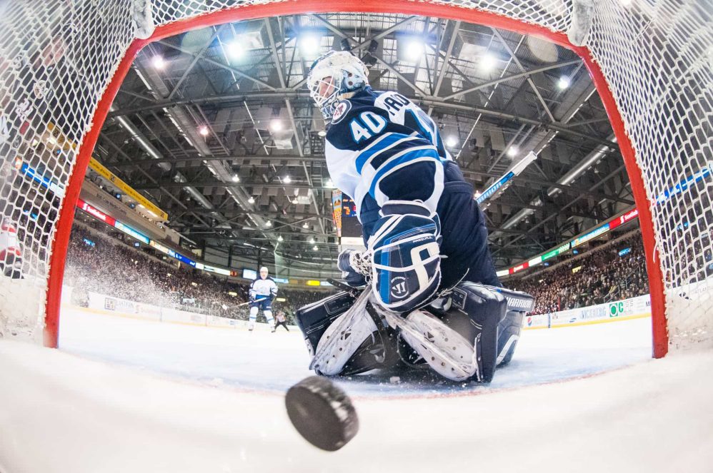 Eddie Pasquale watches one squeek through his five hole from the netcam.