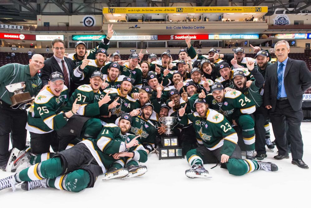 The 2014 Texas Star celebrate winning the AHL Calder Cup with a team photo.